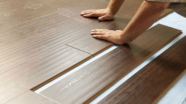 Vinyl flooring being installed